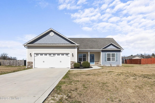 craftsman house featuring driveway, stone siding, an attached garage, fence, and board and batten siding