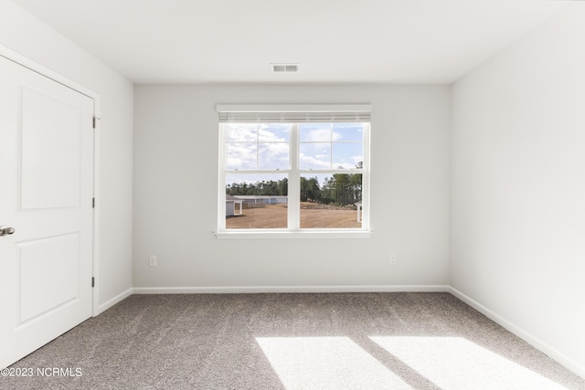 empty room with carpet floors