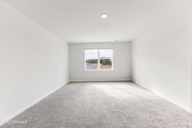 view of carpeted spare room