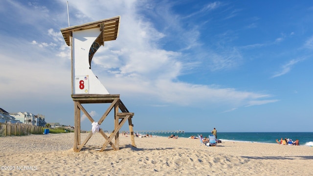 view of water feature with a beach view