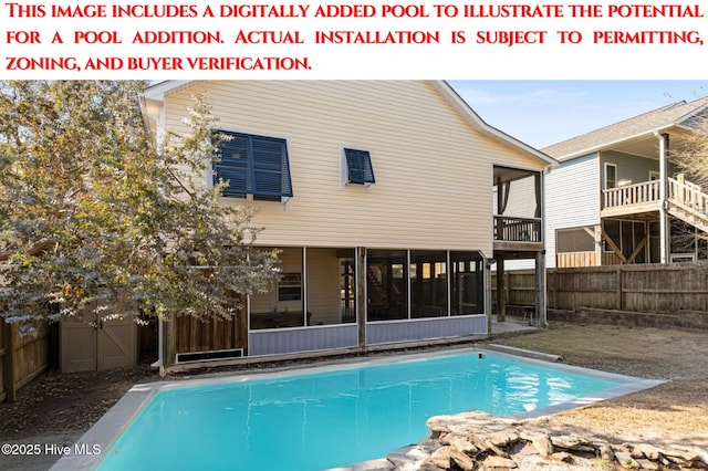 view of swimming pool with a fenced in pool, a fenced backyard, and a sunroom