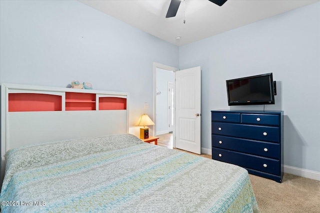 134 NE 11th St, Oak Island, NC 28465 - bedroom with baseboards, carpet floors, and ceiling fan