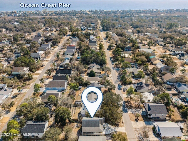 134 NE 11th St, Oak Island, NC 28465 - view of property location with nearby suburban area and a nearby body of water