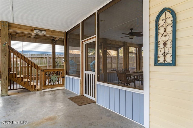 134 NE 11th St, Oak Island, NC 28465 - unfurnished sunroom with a ceiling fan