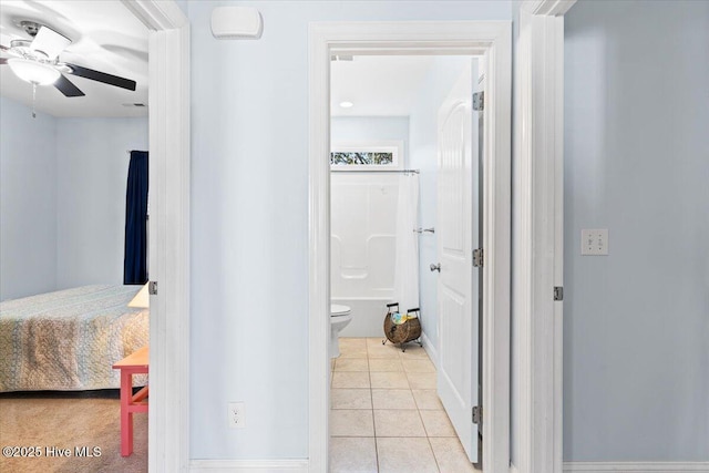 hallway featuring light tile patterned floors