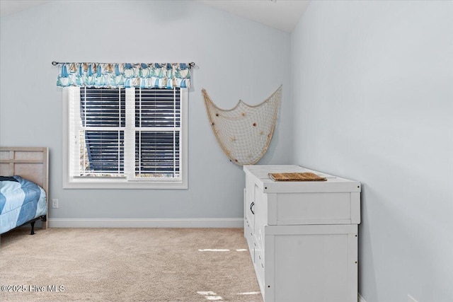 carpeted bedroom with baseboards