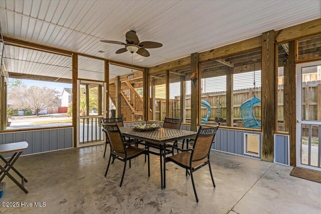 134 NE 11th St, Oak Island, NC 28465 - sunroom with ceiling fan and outdoor dining area