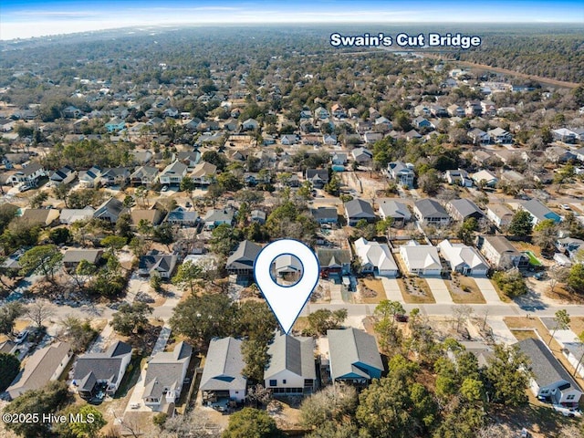 134 NE 11th St, Oak Island, NC 28465 - aerial view of property and surrounding area with nearby suburban area