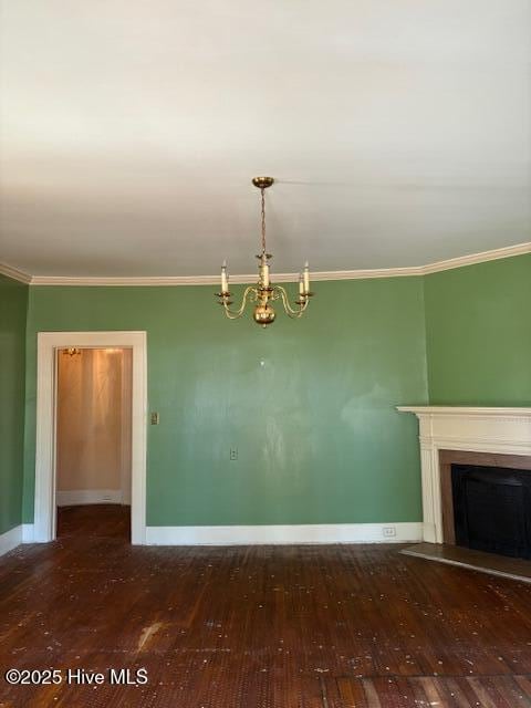 interior space with crown molding, a chandelier, and hardwood / wood-style flooring