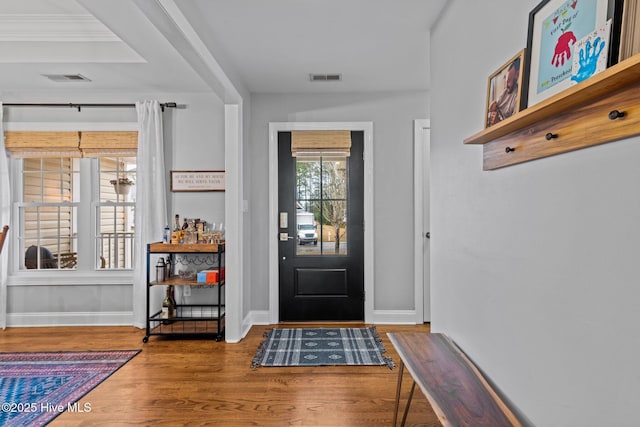 entrance foyer with hardwood / wood-style floors