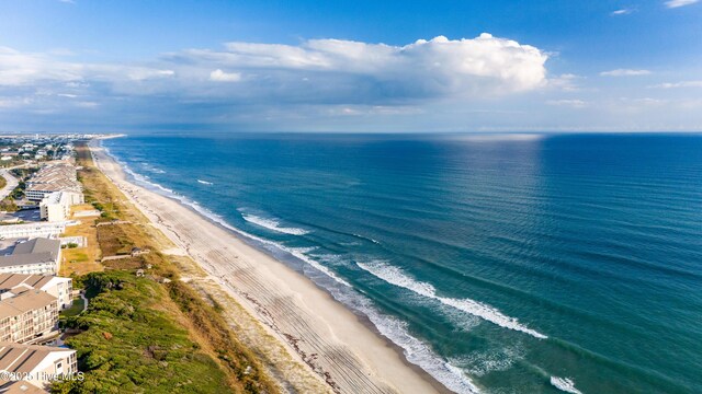 drone / aerial view with a view of the beach and a water view