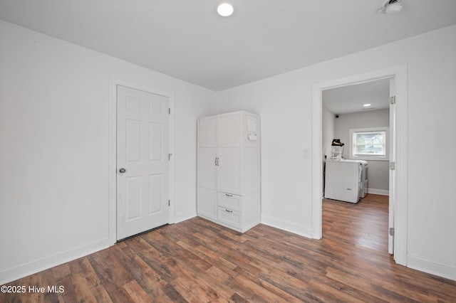 unfurnished bedroom with dark hardwood / wood-style floors