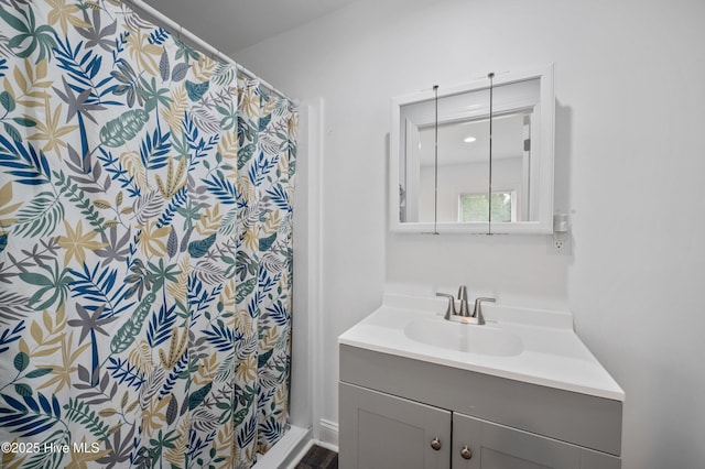 bathroom featuring vanity and a shower with curtain