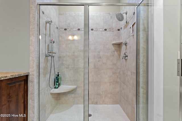 bathroom with a stall shower