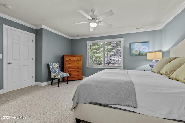 carpeted bedroom featuring a ceiling fan, baseboards, visible vents, and crown molding