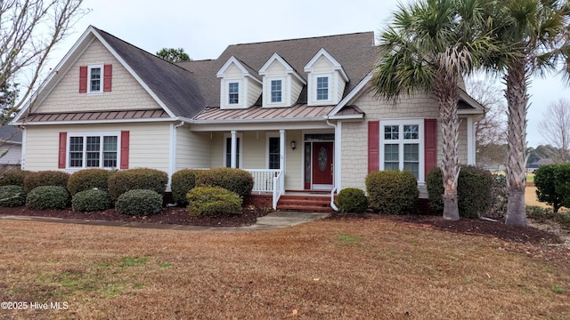 view of front facade featuring a porch and a front lawn