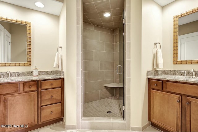 bathroom with vanity and walk in shower