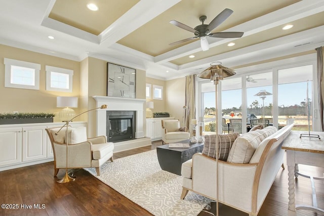 living room with ceiling fan, ornamental molding, a healthy amount of sunlight, and dark hardwood / wood-style flooring