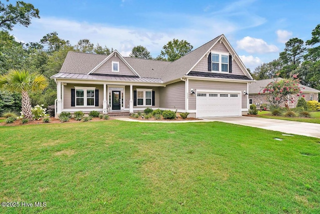 craftsman-style home featuring a front yard and a garage