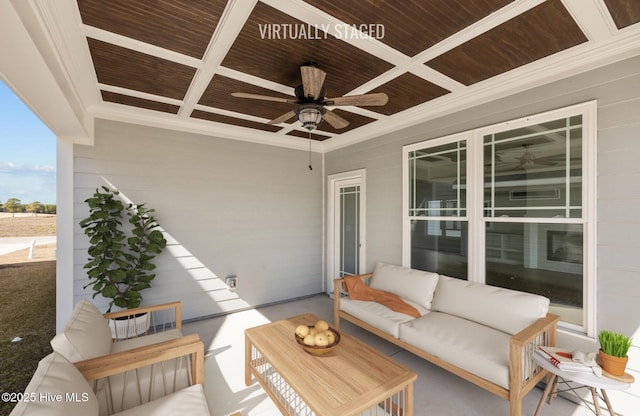 view of patio with ceiling fan and an outdoor living space