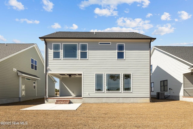 back of house with a ceiling fan and a patio