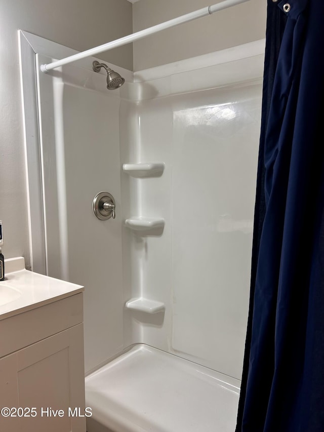 613 Sexton Ave, Zebulon, NC 27597 - bathroom featuring vanity and a shower with curtain