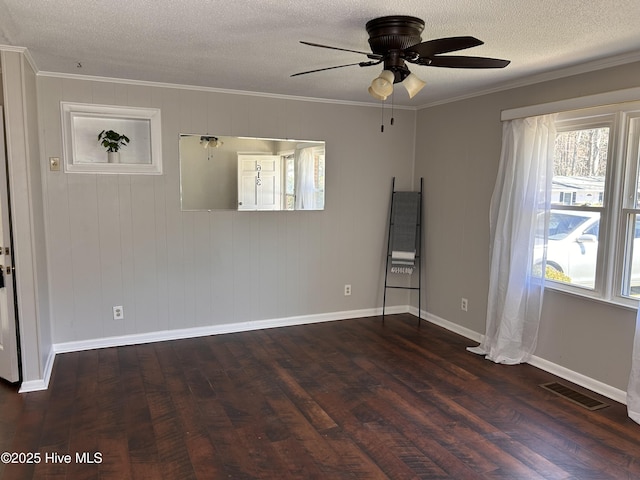 613 Sexton Ave, Zebulon, NC 27597 - empty room featuring a textured ceiling, visible vents, ornamental molding, wood finished floors, and a ceiling fan