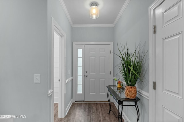 entryway featuring hardwood / wood-style flooring, ornamental molding, and a wealth of natural light