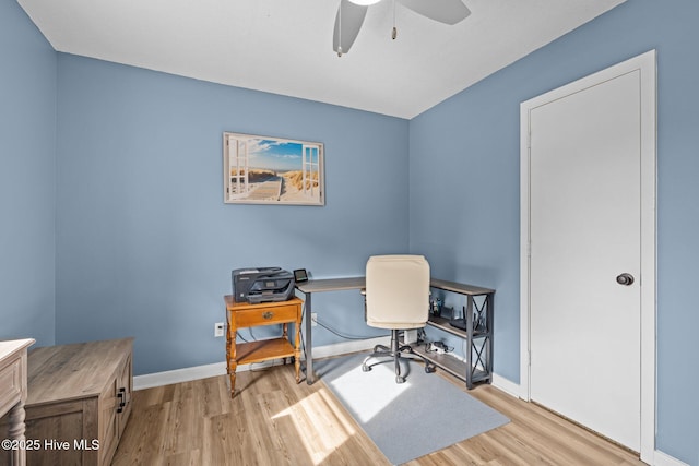 1810 Paulette Rd, Morehead City, NC 28557 - office area with wood finished floors, a ceiling fan, and baseboards