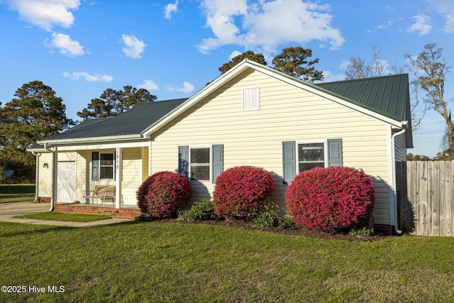 1810 Paulette Rd, Morehead City, NC 28557 - view of home's exterior with covered porch and metal roof