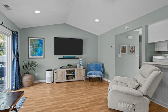 1810 Paulette Rd, Morehead City, NC 28557 - living room with vaulted ceiling, light wood finished floors, baseboards, and recessed lighting