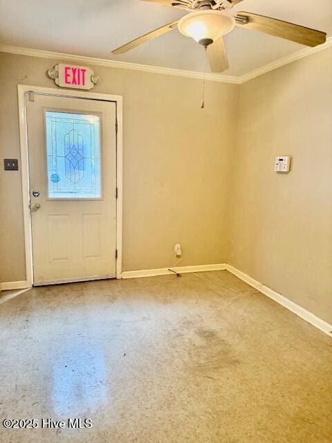 foyer entrance featuring ceiling fan and ornamental molding