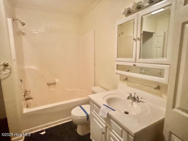 full bathroom with shower / washtub combination, vanity, and toilet