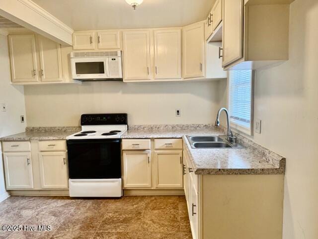 kitchen with sink and white appliances