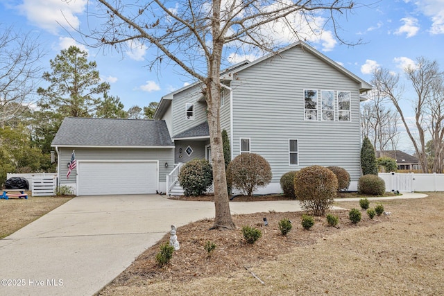 806 Lord Granville Dr, Morehead City, NC 28557 - view of property exterior with an attached garage, driveway, fence, a gate, and roof with shingles