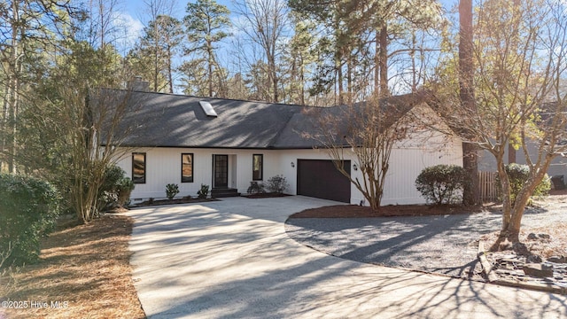 view of front facade with driveway and an attached garage