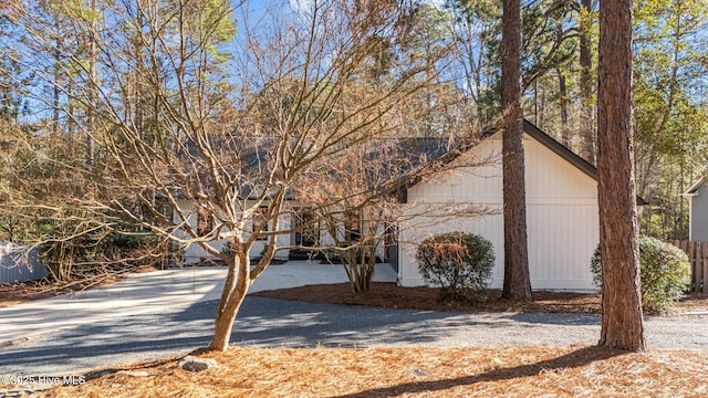 exterior space with gravel driveway