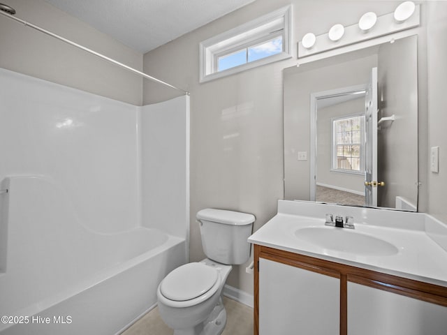 full bathroom with vanity, shower / bathtub combination, and toilet