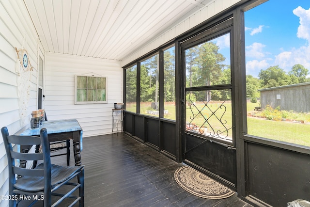 sunroom / solarium with wooden ceiling