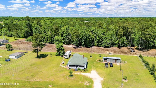 birds eye view of property featuring a rural view