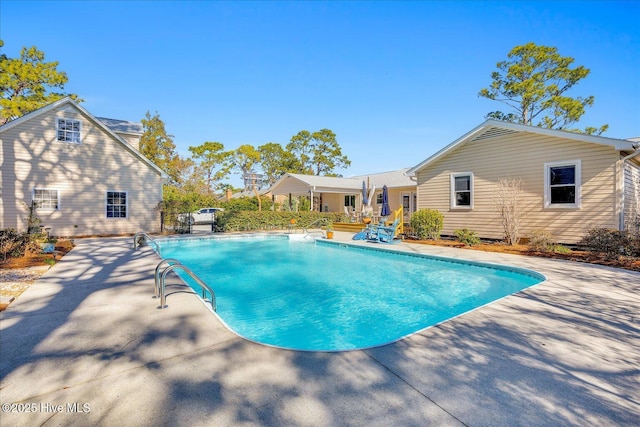 pool with a patio