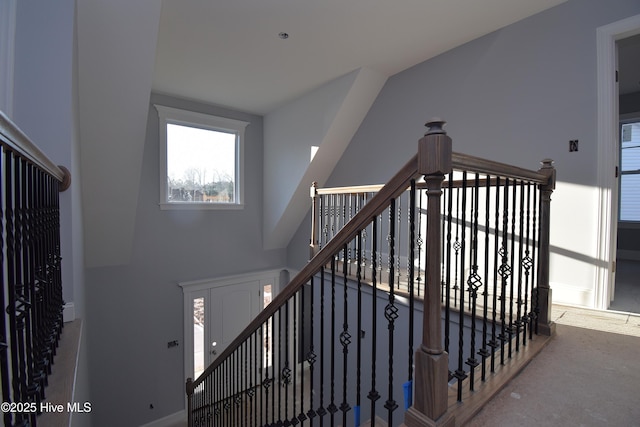 staircase with a towering ceiling