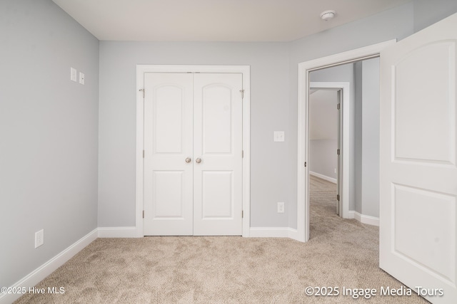 1200 Hunley Ct, Winterville, NC 28590 - unfurnished bedroom featuring a closet, baseboards, and carpet