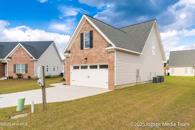 1200 Hunley Ct, Winterville, NC 28590 - view of front of property with roof with shingles, a front yard, brick siding, an attached garage, and concrete driveway