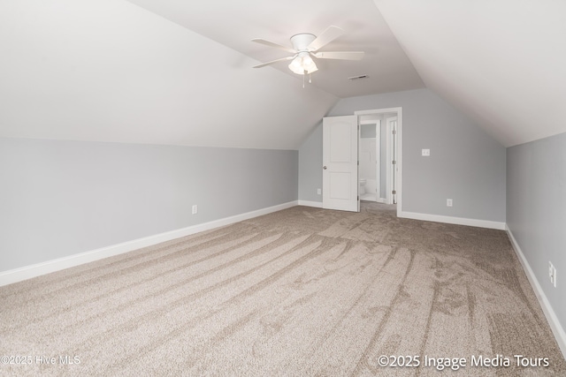 1200 Hunley Ct, Winterville, NC 28590 - additional living space with visible vents, ceiling fan, carpet flooring, and lofted ceiling