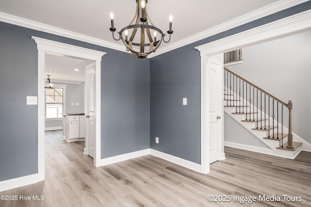 1200 Hunley Ct, Winterville, NC 28590 - interior space featuring stairway, light wood-style floors, baseboards, and an inviting chandelier