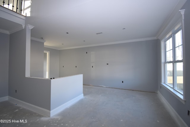 spare room featuring ornamental molding