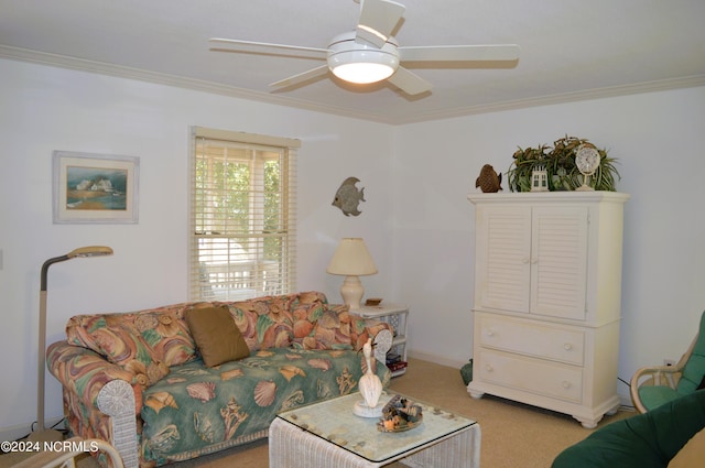 living room featuring crown molding, light carpet, and ceiling fan