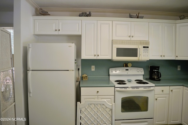 kitchen with ornamental molding, white cabinets, and white appliances