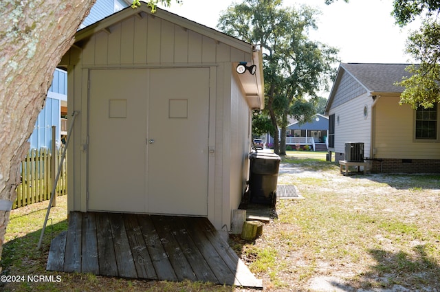 view of outbuilding featuring central AC unit